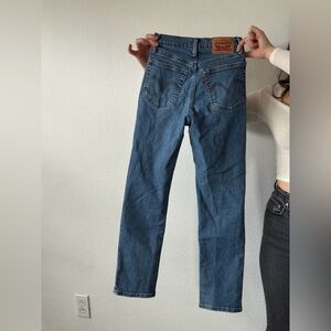 Dark wash Levi’s skinny fit